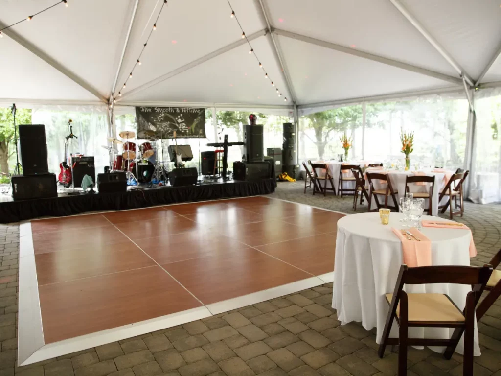 Dance Floor Rental by Collective Event Group for a Wedding under a Tent