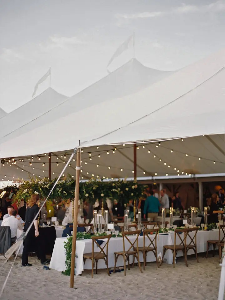 Sailcloth Tent with Tuscan Lighting set up for Rehoboth Beach Wedding, Indian River Life Saving Station
