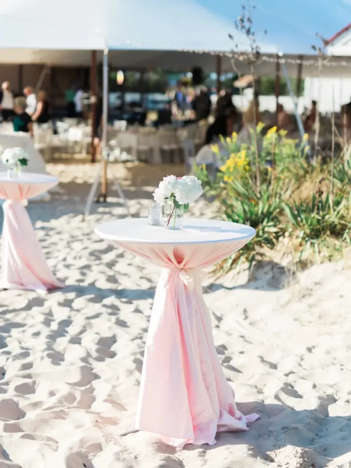 Cocktail Tables with Linens for a Cocktail Hour during a beach wedding