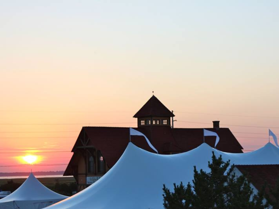 Sailcloth Tents at sunset at Indian River Life Saving Station Wedding Venue Delaware Seashore Wedding