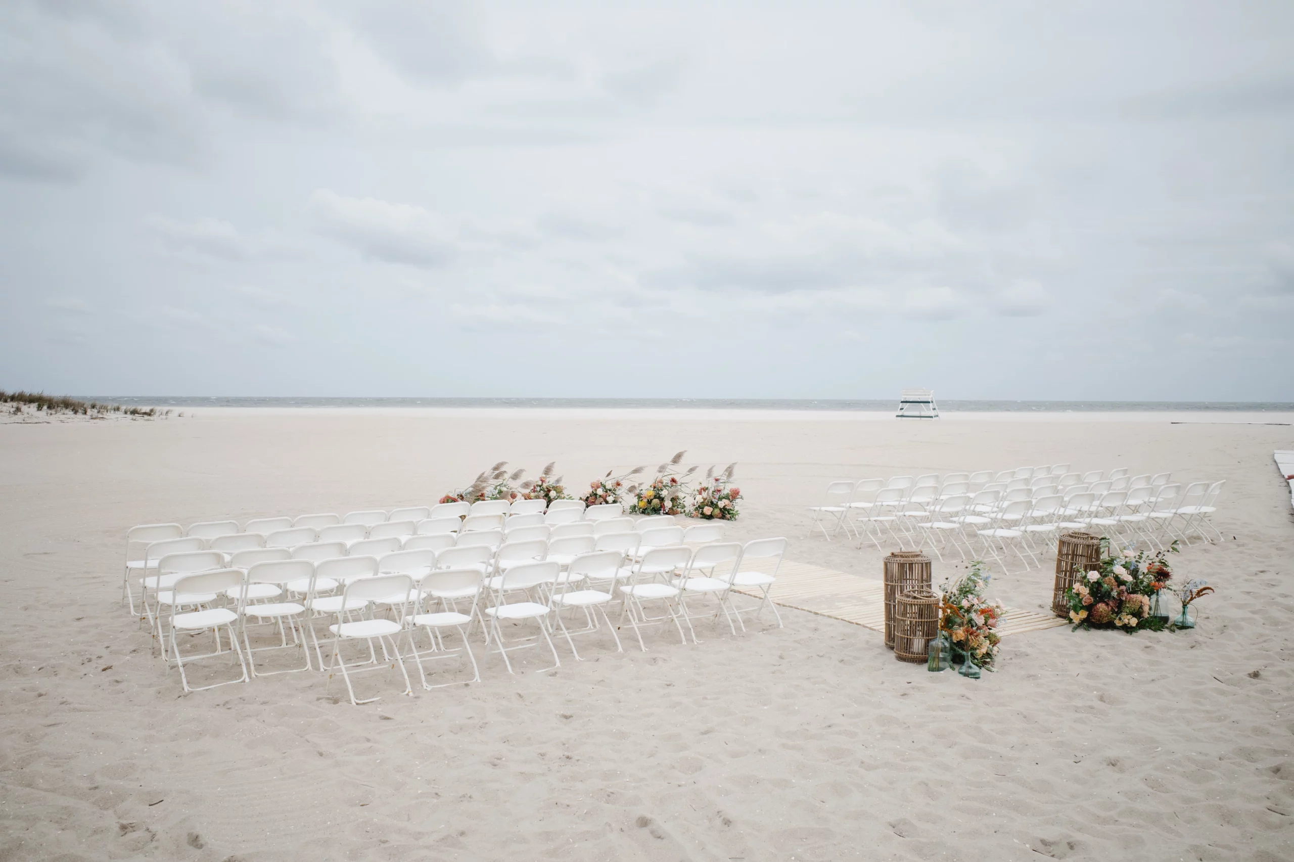wedding chairs set up on beach