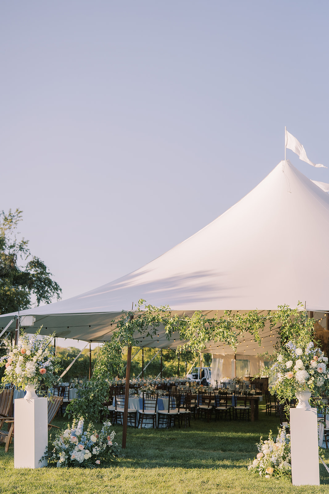 wedding tent greenery entrance