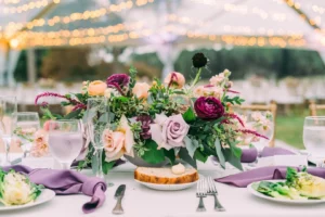 purple flower arrangement center piece on table