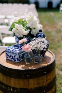 wine barrel with floral decor set on top