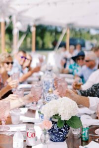 wedding guests toasting with pink glassware