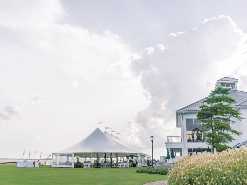 white wedding tent set up on lawn