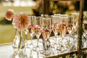 champagne flutes on glass stand