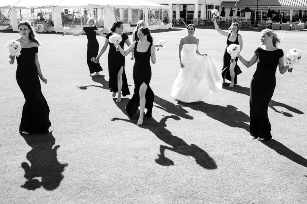 bride walking with bridesmaids