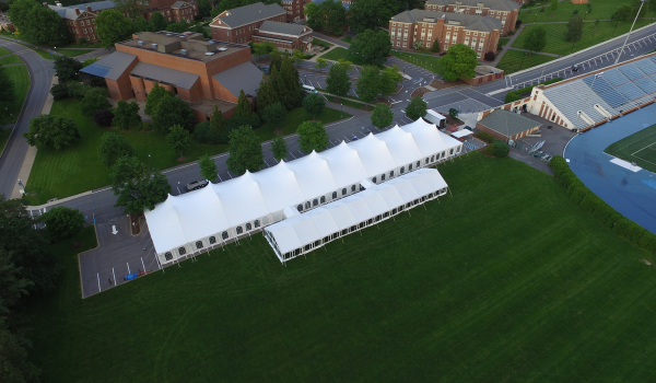 Drone View of two large tents connected for a campus event