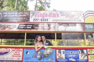 Bride and Groom posing on the trolley