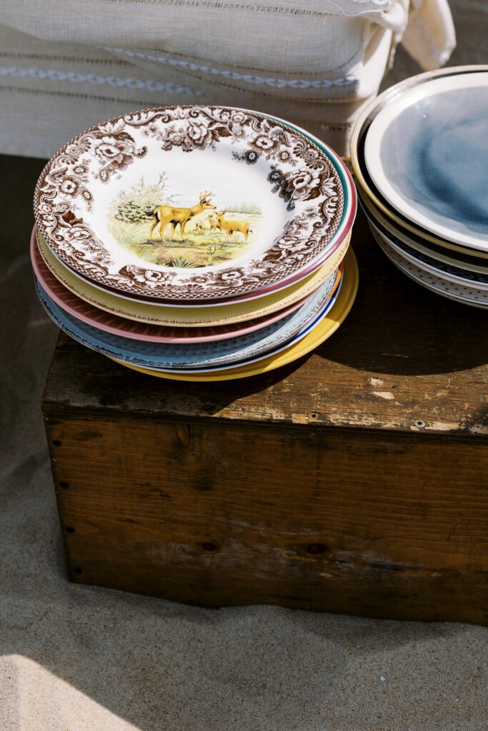 vintage plates stacked on table