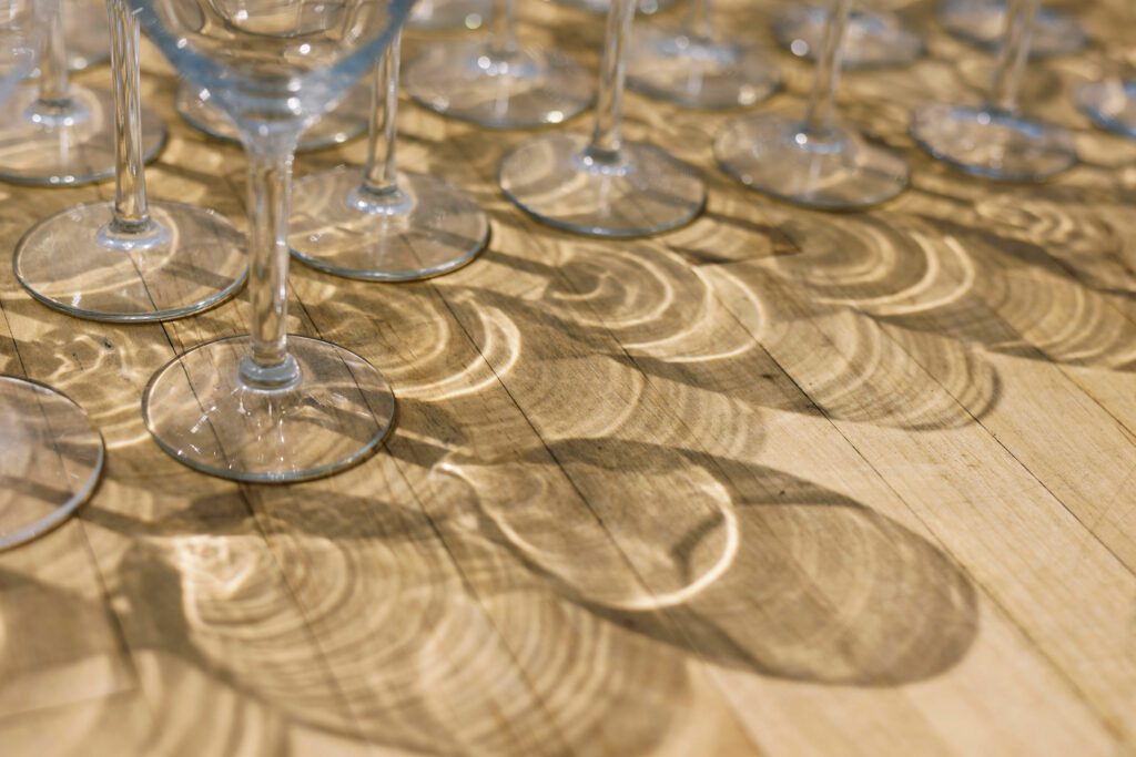 wine glasses on wood table top