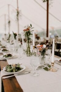 sailcloth tent interior with farmhouse tables