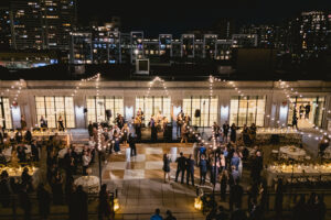 rooftop wedding in philadelphia with overhead lighting