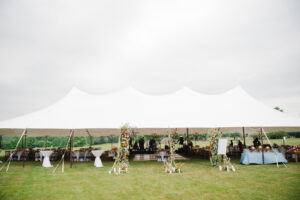 sailcloth wedding tent, set up on grass