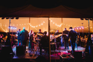 wedding tent with string lights draped throughout